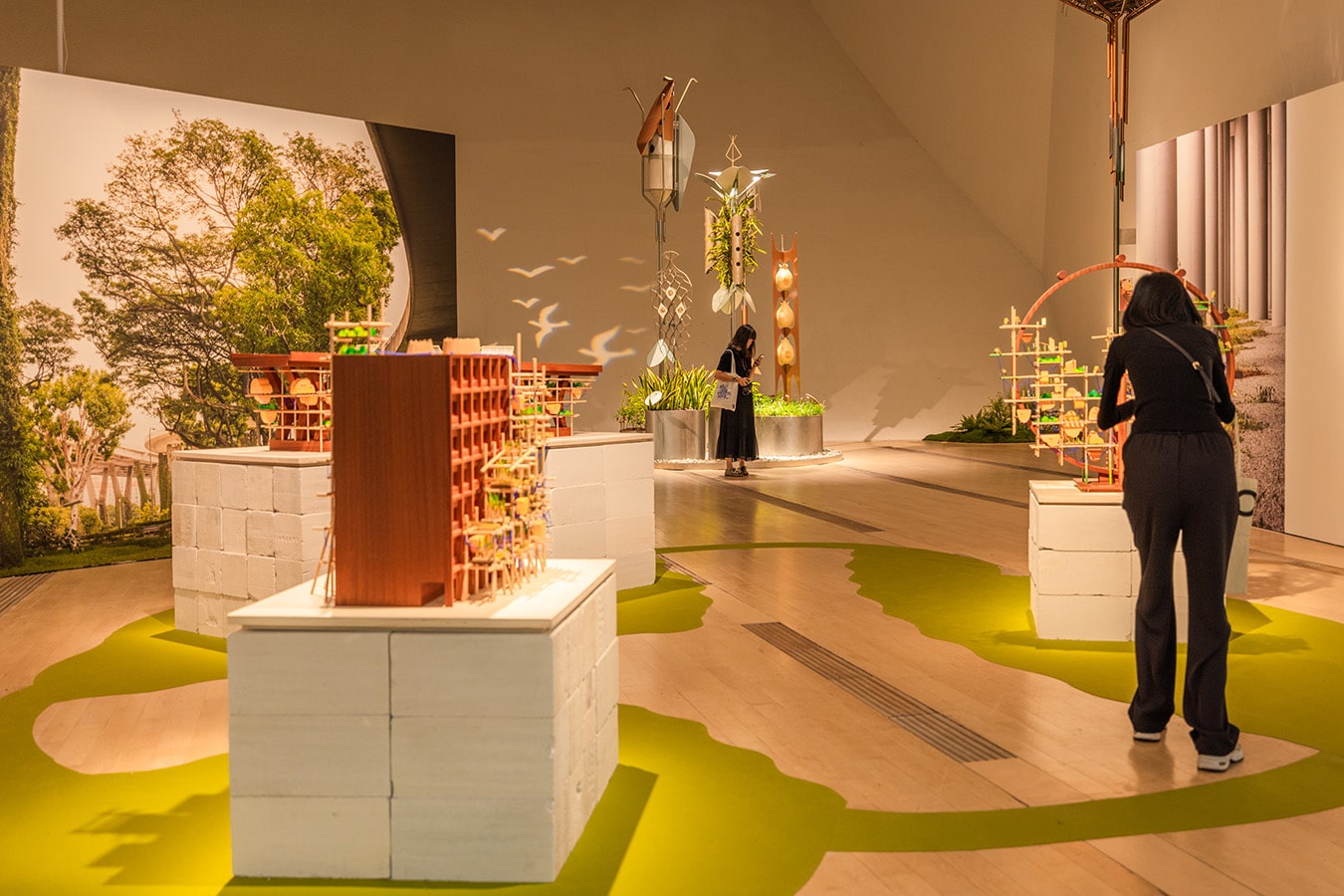 Visitors exploring the “Another World Is Possible” exhibition at ArtScience Museum, Marina Bay Sands, Singapore.