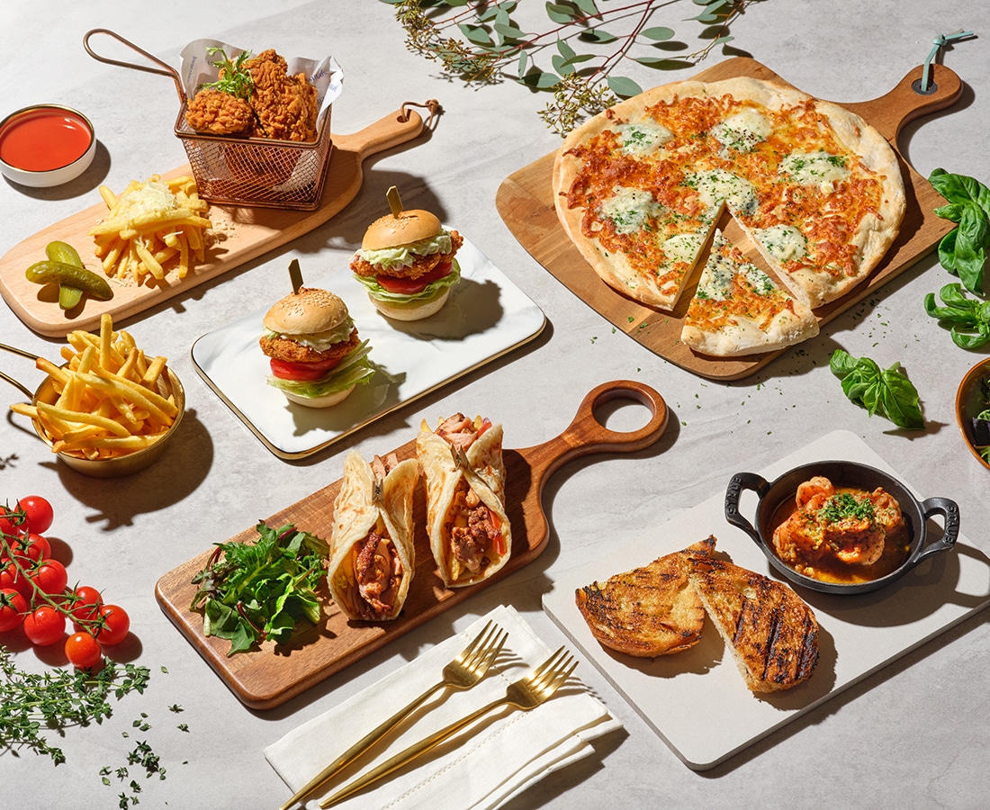 Daily specials at Crossroads Cafe, Singapore Marriott Tang Plaza Hotel, featuring pizza, mini burgers 