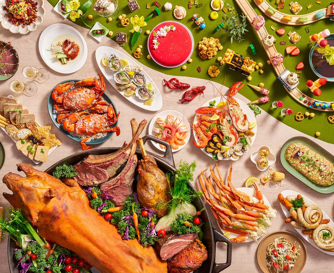 Sunday Funday Brunch buffet at Edge, Pan Pacific Singapore, featuring whole roasted meats, oysters, crabs, sushi, desserts, and family-friendly interactive dining setup.