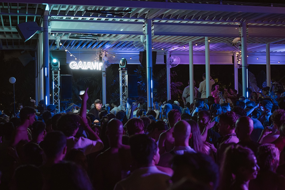 DJ performing at GAIAVIP’s F1 Singapore 2025 afterparty, with vibrant lighting and energetic crowd at Capitol Theatre Kempinski.