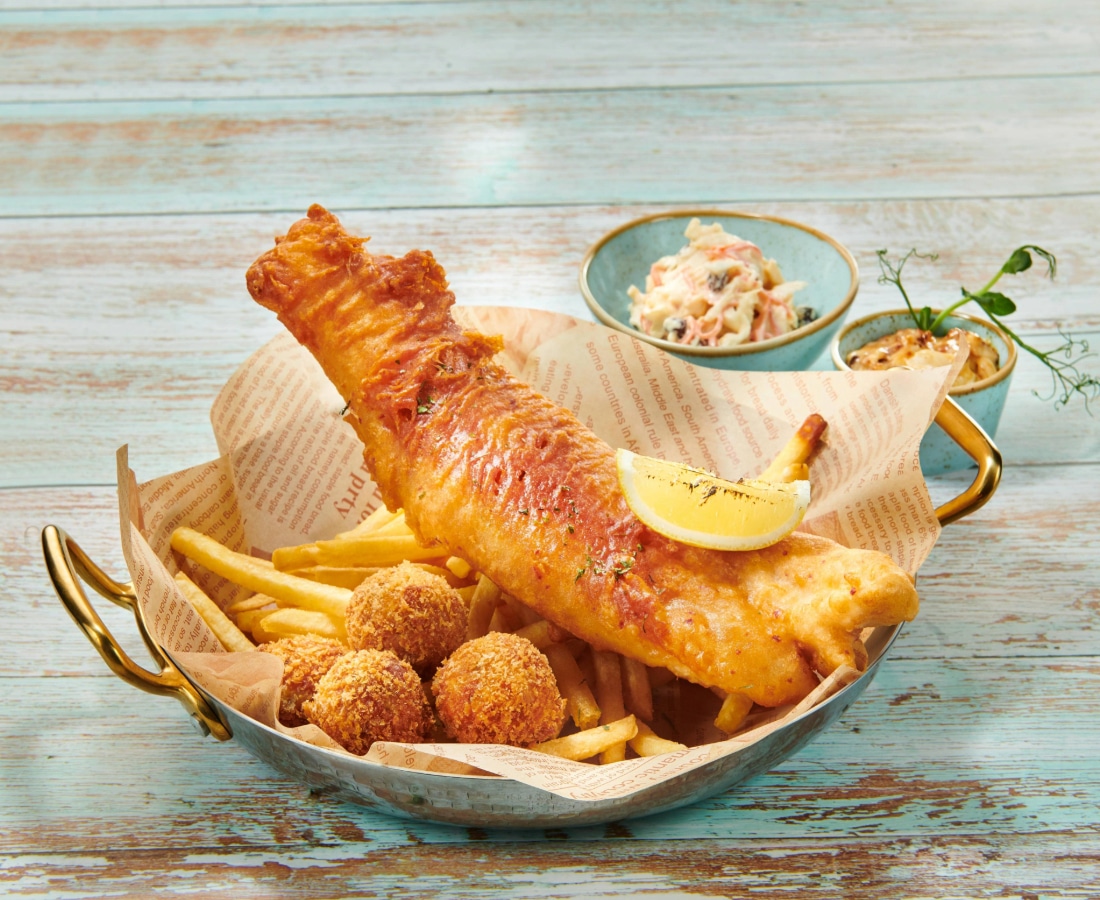 a photo of fish and chips at american mass hall in singapore