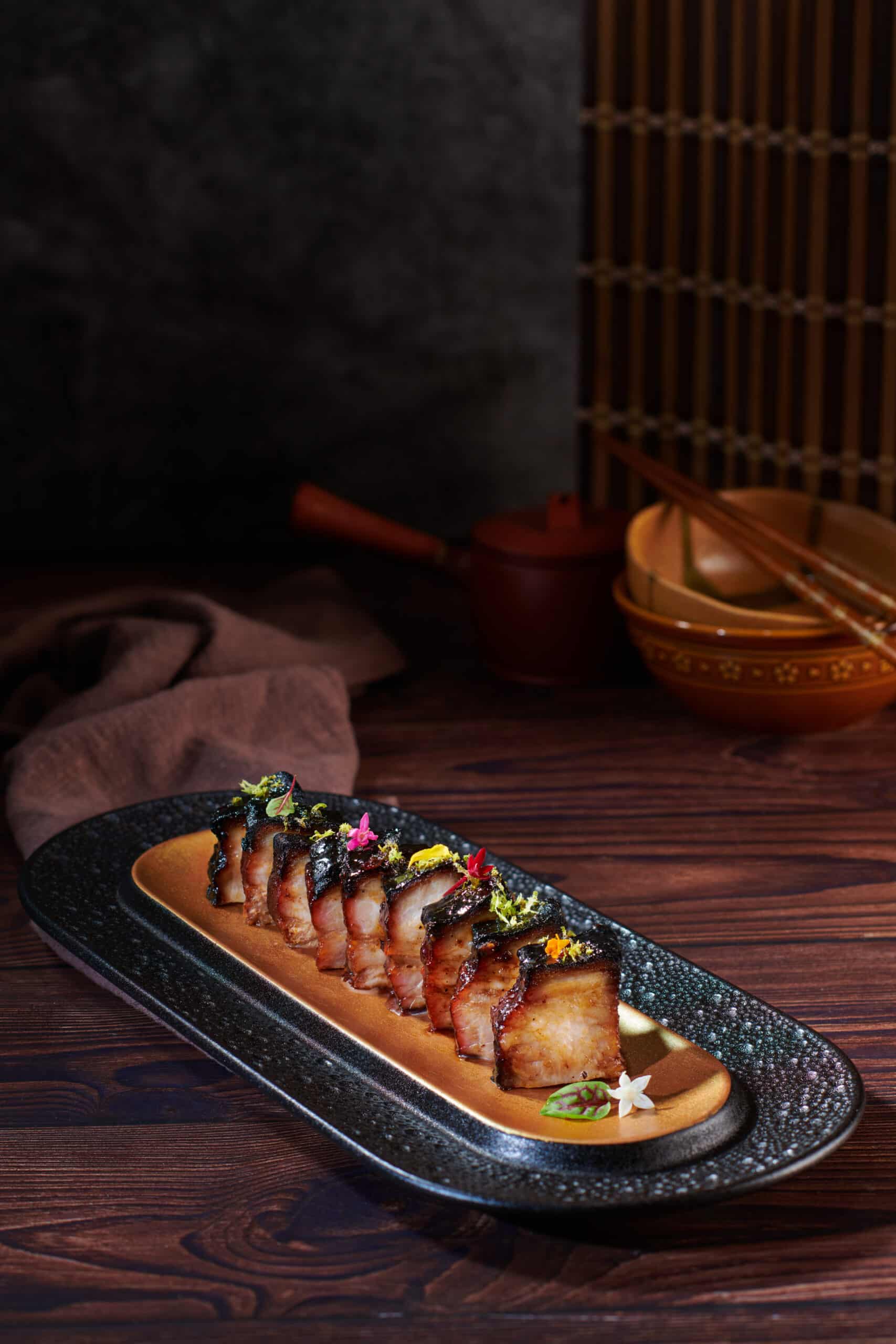 a photo of Mansion 7's Kurobuta char siew glazed in Mao Tai sauce