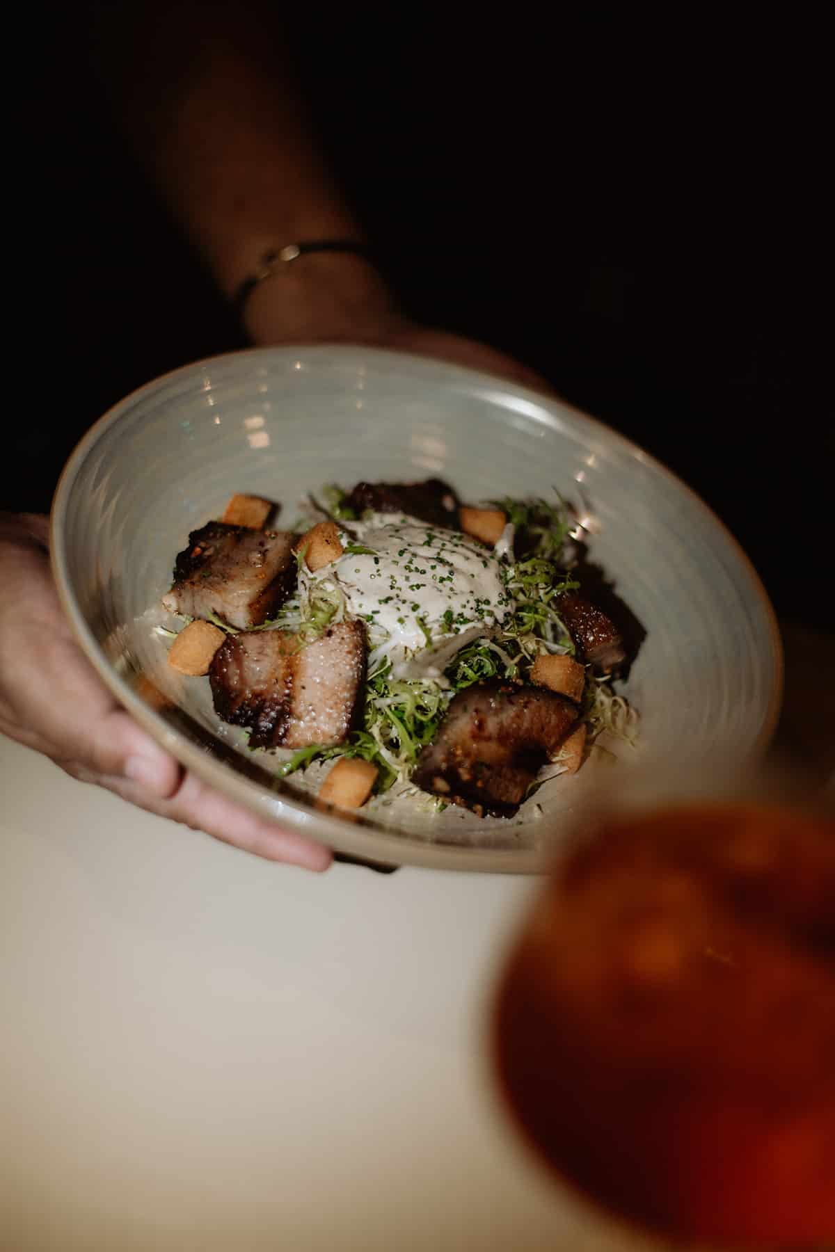 French pork belly confit salad, Rillons de Touraine, served at Merci Marcel in Robertson Quay – elegant bistro-style plating.