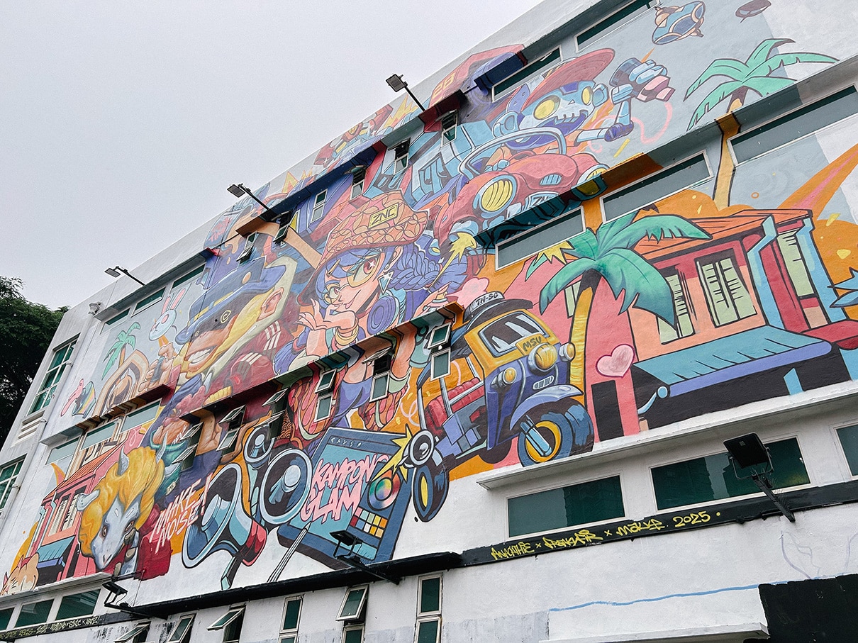 Street art mural by ZNC in Kampong Glam Singapore, showcasing vibrant local culture near Coliwoo Hotel Kampong Glam