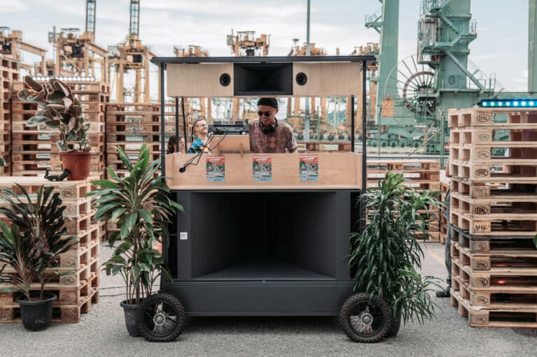 Nomad Solar Sound is a solar powered soundsystem mounted on a wheel cart.