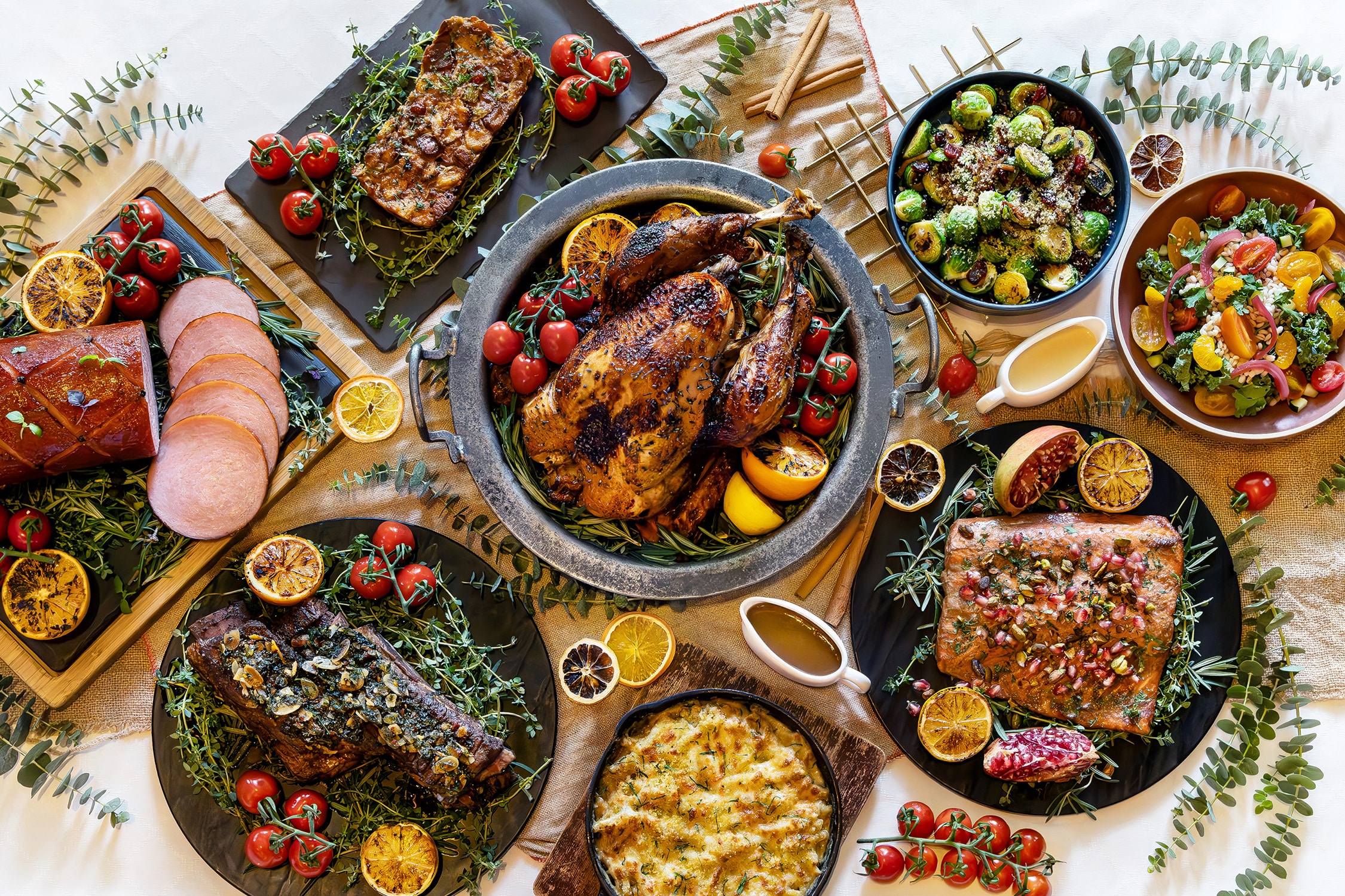 The Marmalade Pantry Christmas feast with roasted turkey, bourbon-glazed ham, Australian short ribs, herb-crusted salmon, and festive sides for takeaway.